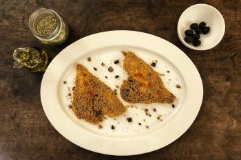 pagello in crosta di pane e olive