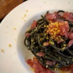 Spaghetti al nero di seppia con bottarga e tartare di tonno